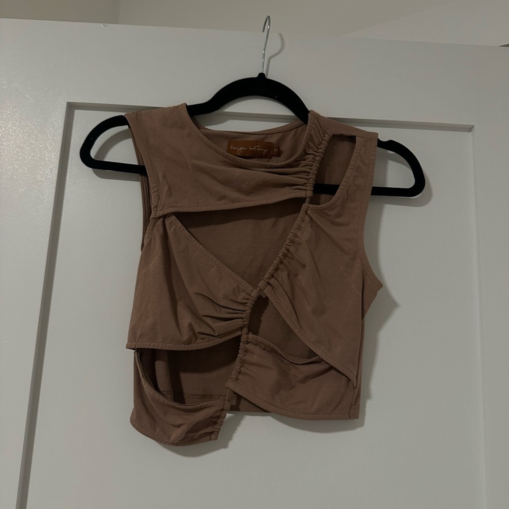 Tan going out top